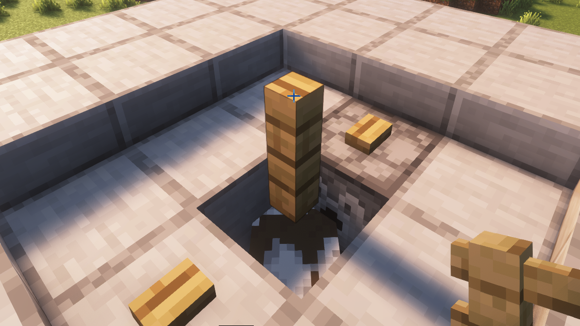Fence post placed on top to prevent falling into mob chamber