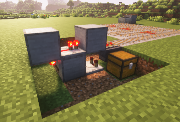 Hopper minecart unloader system with comparator and redstone torch for slime farm